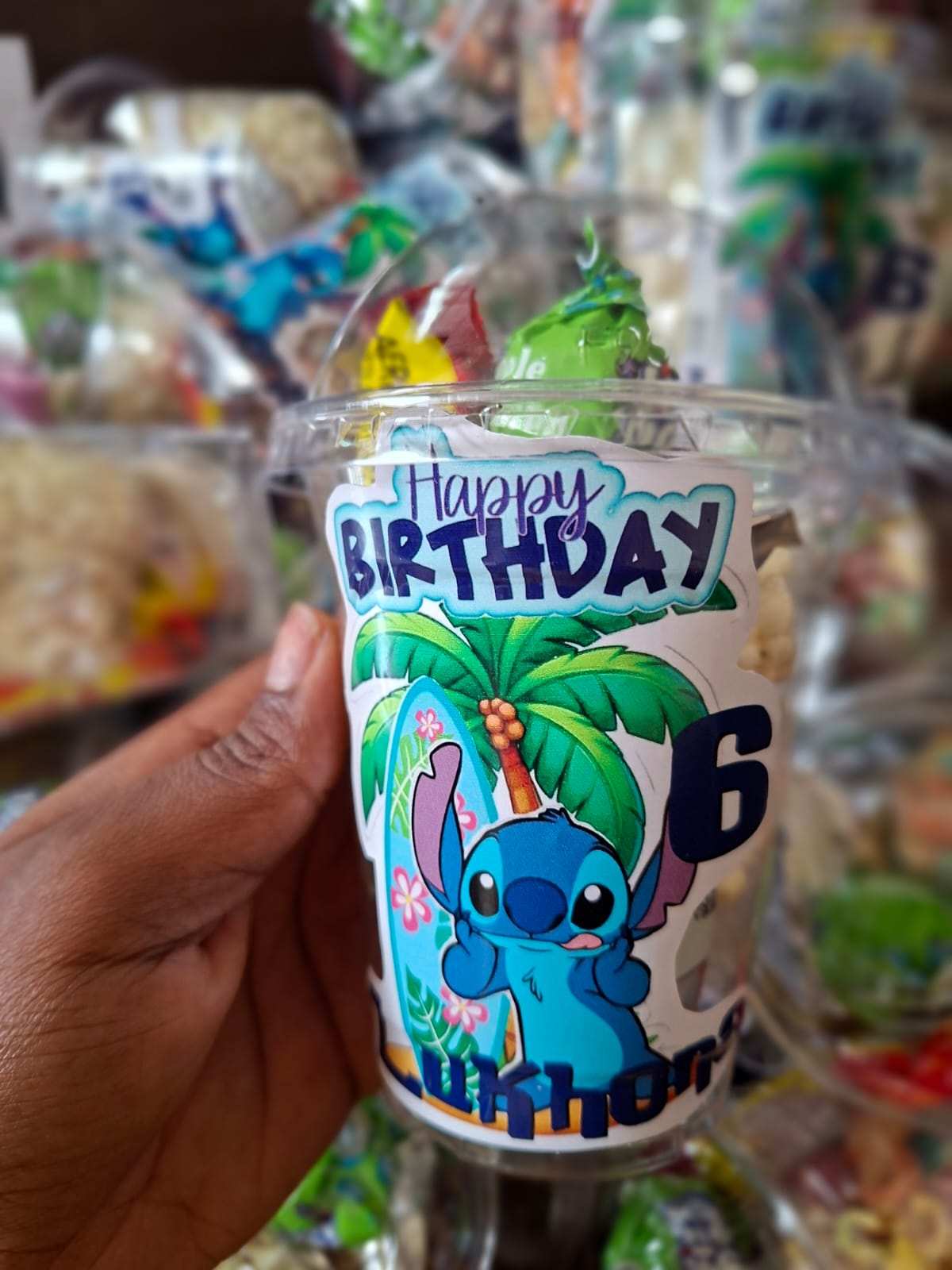 Party cups filled with sweet treats